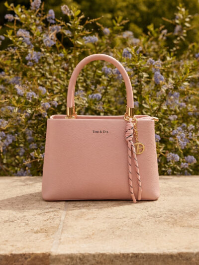 Sac élégant avec accessoire tressé et détails dorés